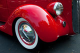 photo:  Bright red car fender